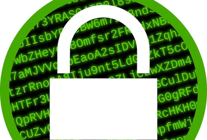 IMAGE: A white lock in a background of green letters on a black background